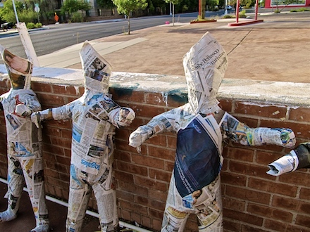 Untitled photo by John Levy of three newspaper-mache pinata forms